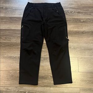 2 pair of Men's Black Insulated Cargo Pants, size 36.
Waist: 17.5”
Inseam: 31”